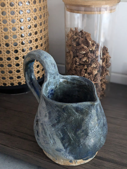 Blue rustic textured milk jug