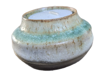 Cute hand thrown tea light holder